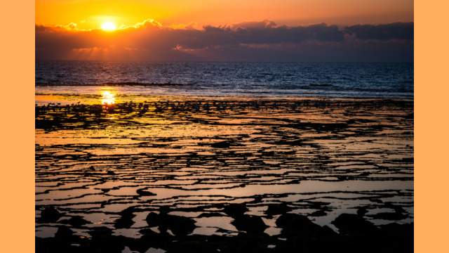 Portugal's Atlantic Ocean's beach at sunset